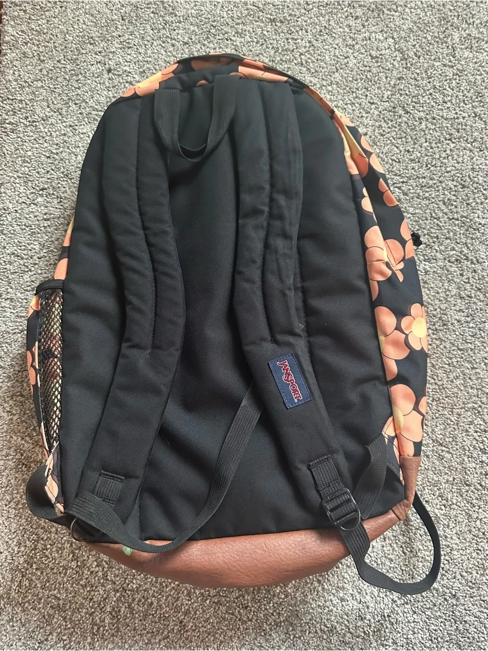 Jansport Black Backpack with Peach & yellow Floral Print